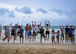 group jumping in the air on Macao Beach, Dominican Republic