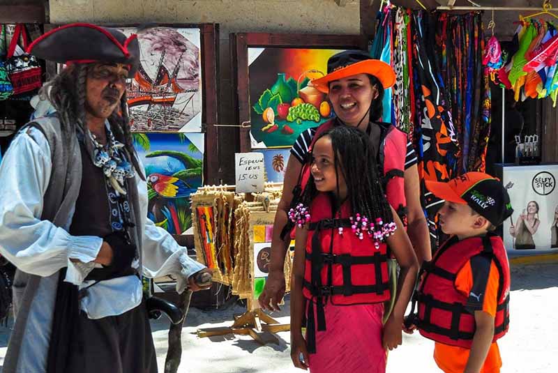 Family having fun with pirate from Ocean Adventure tour - Dominican Republic