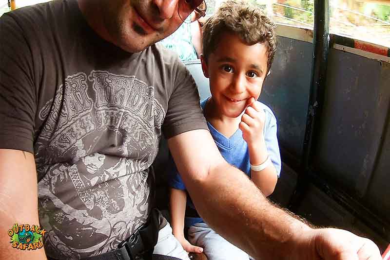 father and son riding on Outback Safari truck in Punta Cana -Outback Adventures