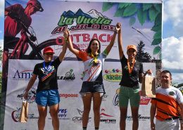 female mountain biker on podium after mountain bike race in Punta Cana