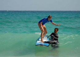 girl getting surf lessons in Macao - Punta Cana